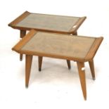 A pair of Chinese wooden tables. The top