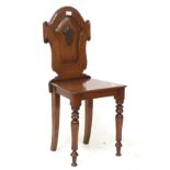 A Victorian mahogany hall chair. With ca