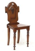 A Victorian mahogany hall chair. With ca