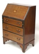 A George III style mahogany bureau. The