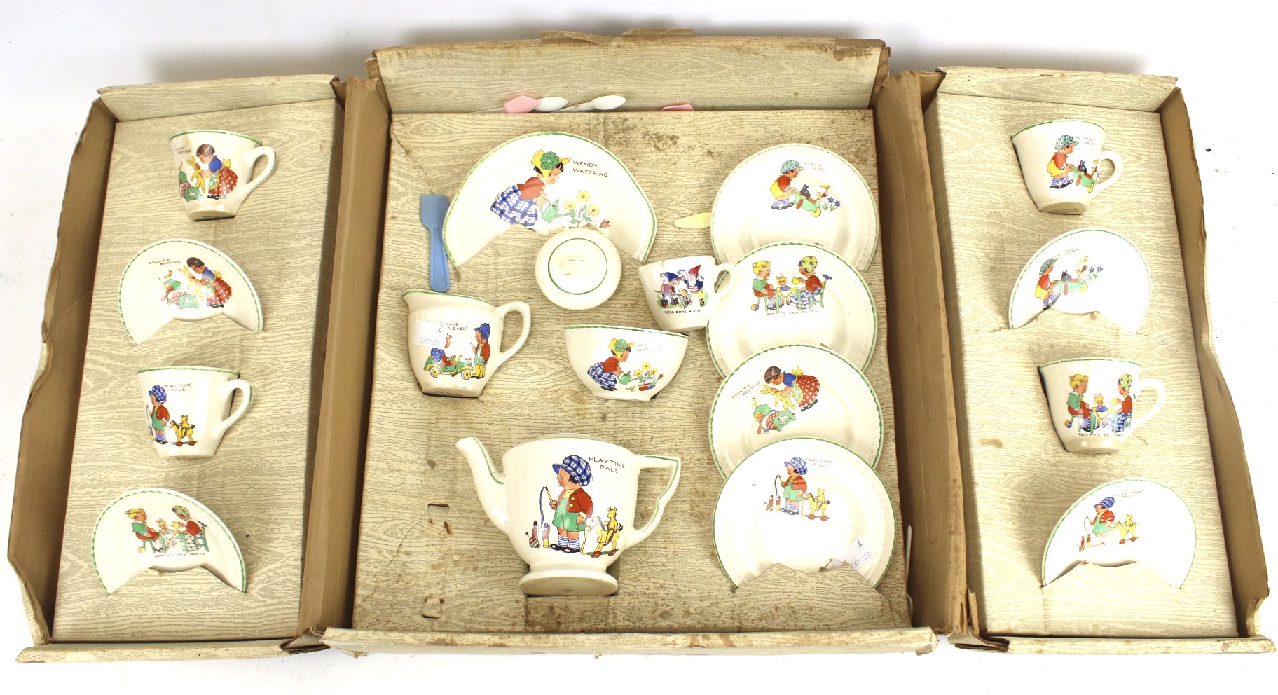 A vintage boxed six piece childs' tea se