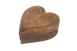 A vintage Kashmiri carved wooden heart-shaped box.