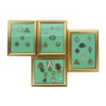 Military Medals and Cap Badges - Three frames containing military cap badges to include Dorsetshire,