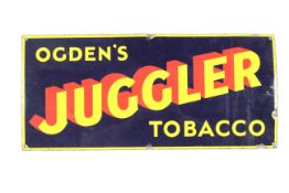 A vintage enamel Ogden's Juggler Tobacco advertising sign.