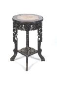 A circa 1900 Chinese marble topped hardwood stand /table with 8 lobed rouge marble inlay,