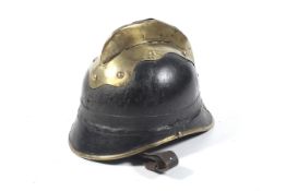 A WWI German Fireman's / Firefighter's helmet with brass trimming ,