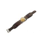 WWII (2) - A K. M. Zentra WWII German military wrist watch with leather wrist strap .