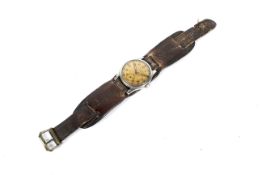 WWII (2) - A K. M. Zentra WWII German military wrist watch with leather wrist strap .