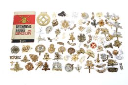Army and military :A collection of assorted military cap badges (approx 65) plus a few shoulder
