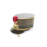 An Italian Artillery dress cap with crossed gilt canons , swords and a grenade ,