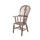 A 19 th century North Country Ash and Elm Windsor armchair,