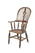 A 19 th century North Country Ash and Elm Windsor armchair,