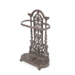 A Victorian style painted cast iron stick \ umbrella stand of floor mount form with removable