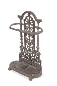 A Victorian style painted cast iron stick \ umbrella stand of floor mount form with removable