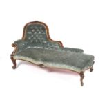 A Victorian Mahogany Chaise lounge with show wood surround, carved decoration,