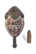 Ethnographic Native Tribal : A carved wooden face mask having whiter decoration and with handle