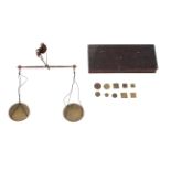 A set of coin balance scales including Royal Mint 'Cur Weight Sovereign' dated 1821 in a mahogany