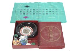 Roulette- Dal Negro Treviso-Italia, a boxed ( bred Morroco colour) gambling set to include wheel,