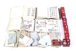 A box of stamp albums and covers of the world Condition Report: The small red boxes