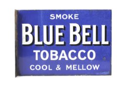A vintage enamel double sided blue-ground advertising sign for Blue Bell Tobacco.