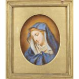 A framed late 19th century oval portrait miniature of the Virgin Mary, watercolour on ivory. 8.