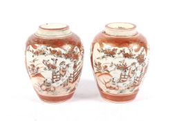 A pair of circa 1900 Kutani vases and covers having flower decoration to the vignettes and signed