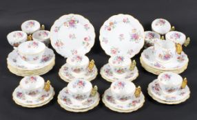 A 1931 Aynsley 12 place Art Deco Butterfly ceramic tea service comprising of 12 side plates,