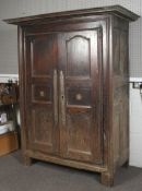 An 18th century French Oak Cupboard,