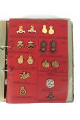 A collection of assorted sixty eight vintage military collar dogs badges.
