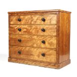 A late 19th century satinwood chest of drawers.