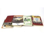 An assortment of vintage motoring magazines.