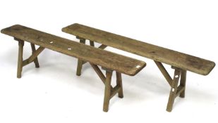 A pair of vintage pitch pine benches.