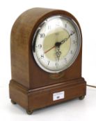 A converted mahogany cased dome top mantle clock. With an electric Smiths Sectric movement.