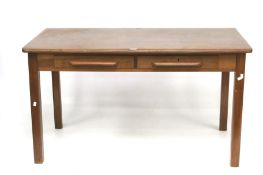 A contemporary teak writing table. With two drawers on square supports.