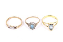 Three vintage gold rings.