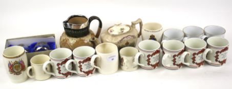 A collection of assorted commemorative ceramics.