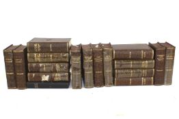 A vintage set of sixteen Charles Dickens novels.