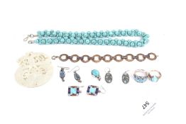 A collection of turquoise and imitation-turquoise jewellery.