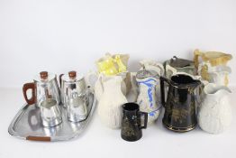 Collection of fourteen assorted 19th century jugs & a tea set.