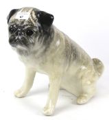 A vintage Winstanley pottery pug dog figure. Signature to base and #9.