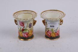 A pair of early 19th century Coalport porcelain vases.