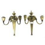 A pair of Georgian style two branch brass wall lights.