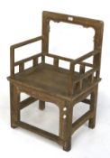 A traditional Chinese style teak open armchair.