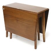 A mid-century wooden drop leaf table.