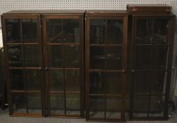 Two 20th century wall mounted mahogany display cabinets.
