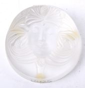 A Lalique paperweight.