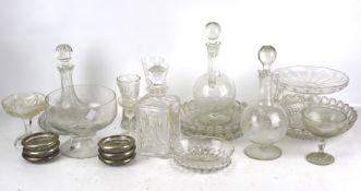 An assortment of 20th century and later glassware. Including decanters, jugs, bowls, etc.