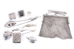 An early 20th century silver mesh evening bag, London 1916, 180g and other items,