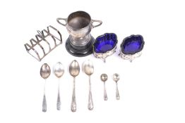 A collection of silver to include; a pair of pierced oval salts.