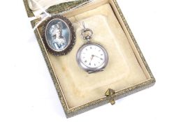 A French silver cased open face keyless fob watch.